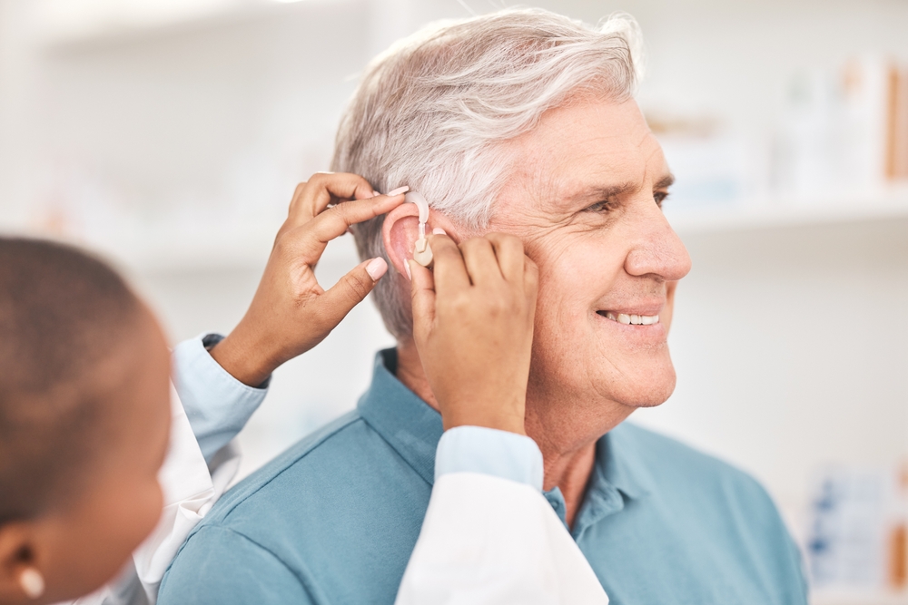 Helping,,Man,And,Doctor,With,Hearing,Aid,,Technology,Or,Healthcare